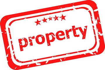 Image showing property on red rubber stamp over a white background