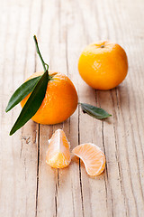 Image showing tangerines with leaves