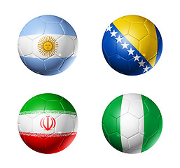 Image showing Brazil world cup 2014 group F flags on soccer balls