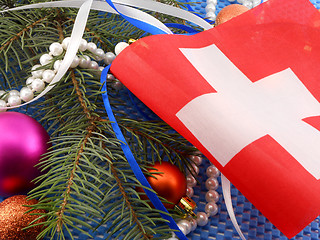 Image showing switzerland flag with christmas decoration, new year card