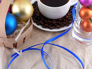 Image showing cup of coffee with cinnamon, coffee beans and christmas balls