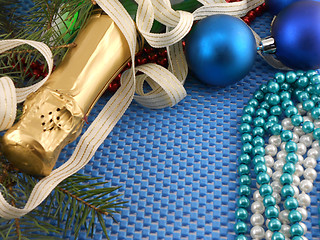 Image showing Beautiful ornaments, champagne, pearl and balls as a New Year decoration