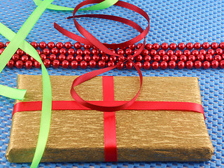 Image showing White gift box with red ribbon bow