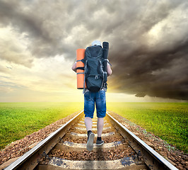 Image showing Tourist on the railroad