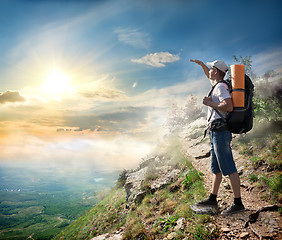 Image showing Tourist looking at the sun