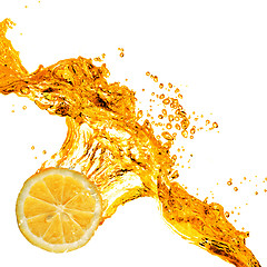 Image showing orange slice and splash of juice isolated on white