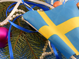 Image showing Sweden flag with christmas decoration, new year card