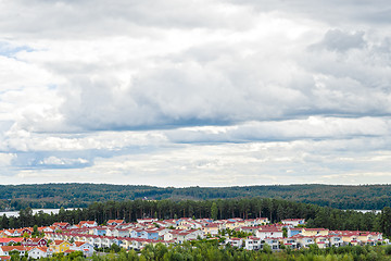 Image showing View over residential neighborhood surrounded by nature