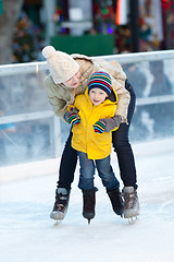 Image showing family ice skating