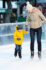 Image showing family ice skating