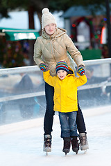 Image showing family ice skating