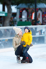 Image showing family ice skating