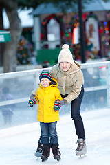 Image showing family ice skating