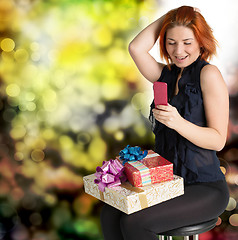 Image showing Emotional smiling woman with boxes gifts