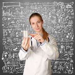 Image showing Doctor woman with cup for analysis