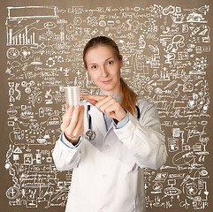 Image showing Doctor woman with cup for analysis