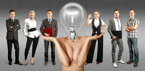 Image showing Business Team With Lamp Head