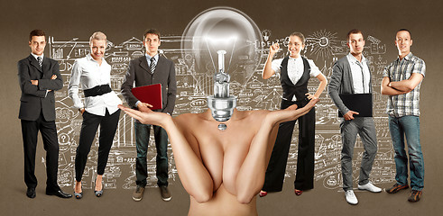 Image showing Business Team With Lamp Head