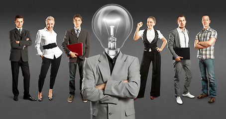 Image showing Business Team With Lamp Head