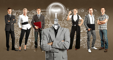 Image showing Business Team With Lamp Head