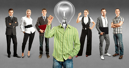 Image showing Business Team With Lamp Head