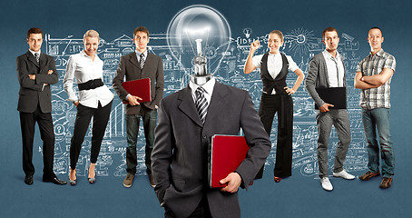 Image showing Business Team With Lamp Head