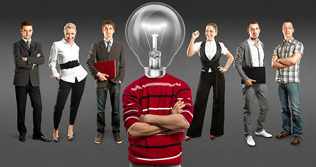 Image showing Business Team With Lamp Head