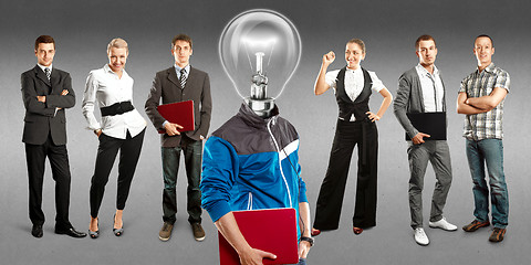 Image showing Business Team With Lamp Head