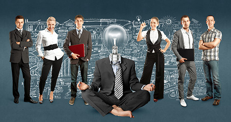 Image showing Business Team With Lamp Head