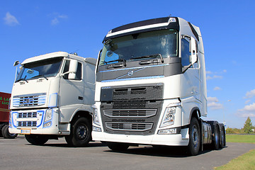 Image showing Two White Volvo FH Trucks