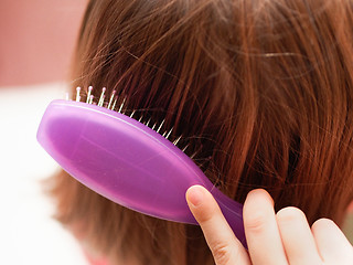 Image showing Brushing the Hair