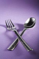 Image showing Crossed spoon and fork