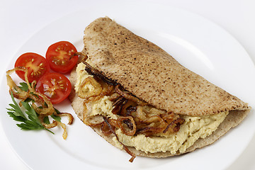 Image showing Fried onion and hummus sandwich