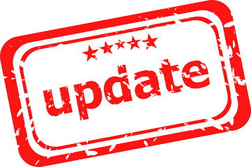 Image showing update on red rubber stamp over a white background