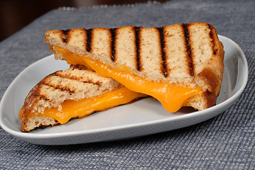 Image showing Grilled cheese sandwich on a blue plate