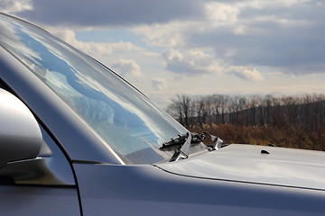Image showing Windshield of the car an wipers.