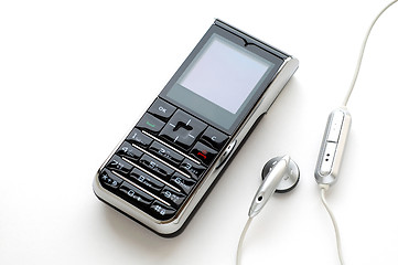 Image showing Mobile phone and the headphone