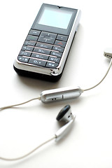 Image showing Mobile phone and the headphone