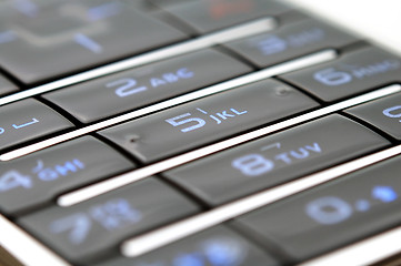 Image showing Close up shot of mobile keypad under light