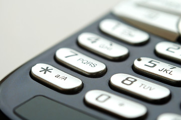 Image showing Close up shot of mobile keypad under light