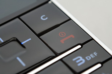 Image showing Close up shot of mobile keypad under light