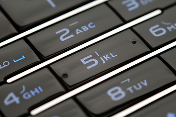 Image showing Close up shot of mobile keypad under light