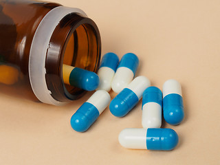 Image showing Blue and white capsules