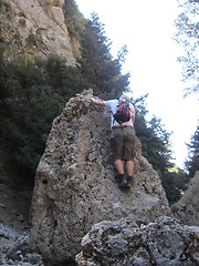 Image showing Climbing a rock