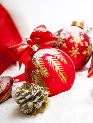 Image showing Christmas ball with red bow and ribbon