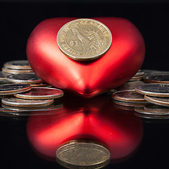 Image showing Red heart and U.S. dollar coins