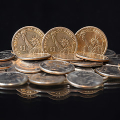 Image showing U.S. dollar coins on a table