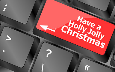 Image showing Computer keyboard key with have a holly jolly christmas words