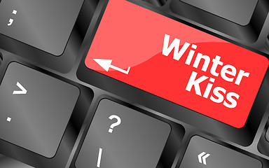 Image showing winter kiss on computer keyboard key button