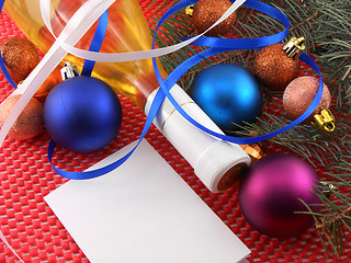 Image showing champagne bottle with christmas ball and blue ribbon, invitation card